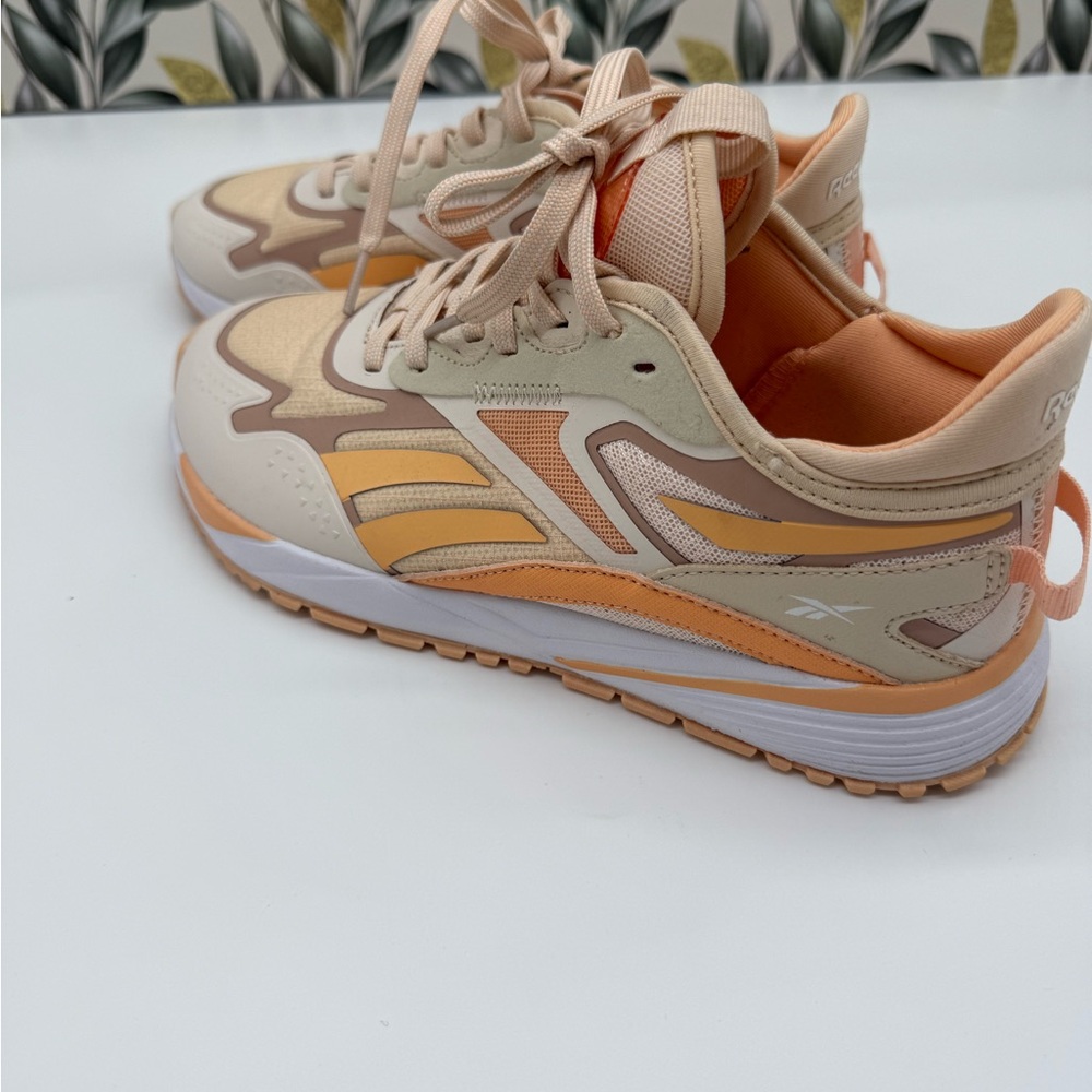 Reebok Lavante Trail 2 women's trainer in the Chalk/Washed Clay/Coral Colorway